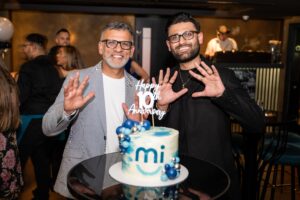 Sandeep Kumar and Rahil Kumar smile while celebrating 10 years of MiSmile.