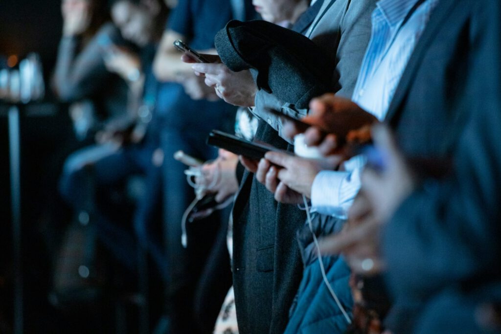 People on their phones in social media